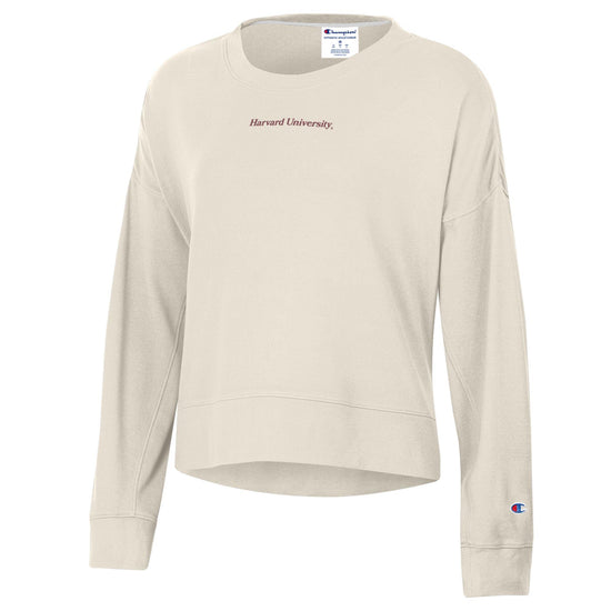 Beige sweatshirt with 'Harvard University' and Champion logos on a white background