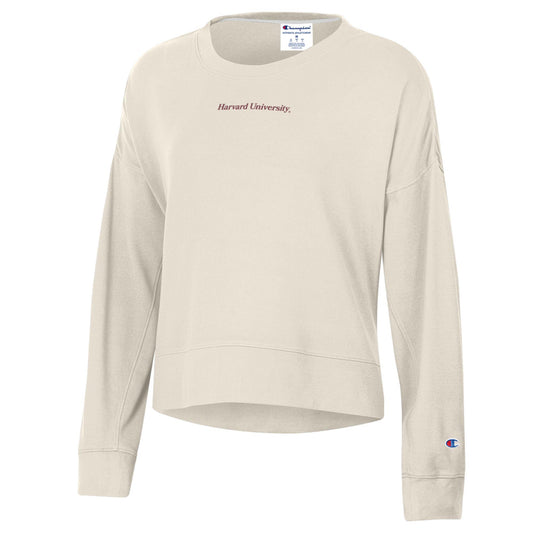 Beige sweatshirt with 'Harvard University' and Champion logos on a white background